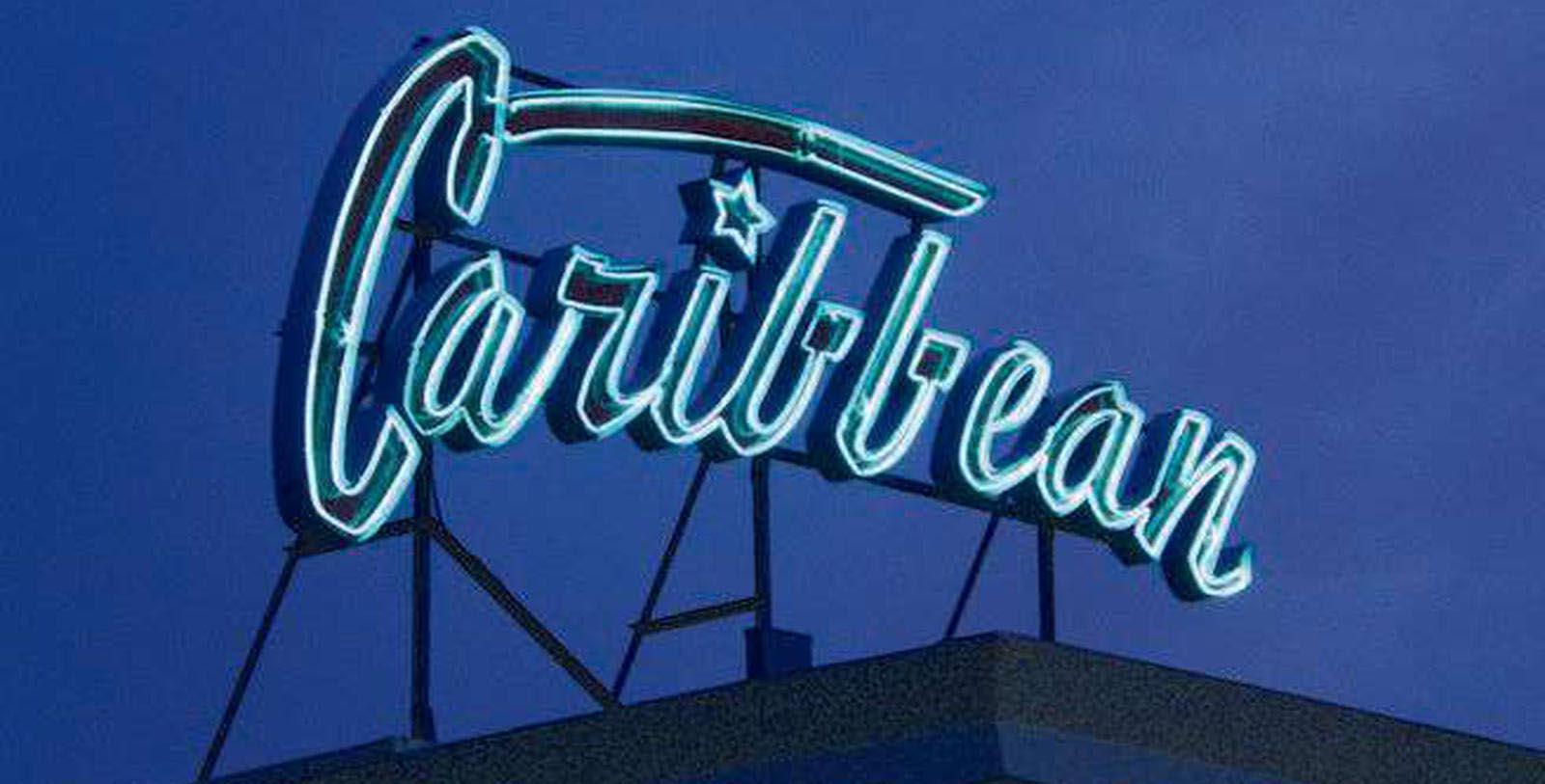 Image of Hotel sign at Caribbean Motel, 1957, Member of Historic Hotels of America, in Wildwood Crest, New Jersey, Experience